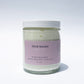 Glass jar of 'Dear Naura' body body in Rose Tea on a white background